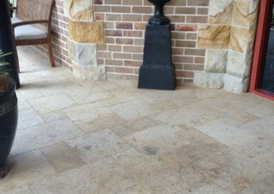 antique travertine unfilled and tumbled french pattern footpath