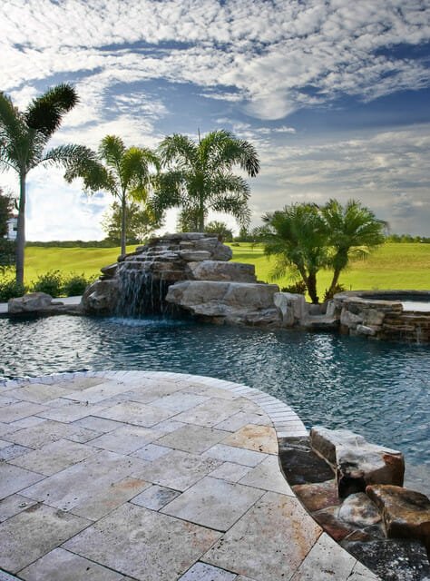 Antique Travertine French Pattern unfilled and tumbled pool pavers and pool coping tiles